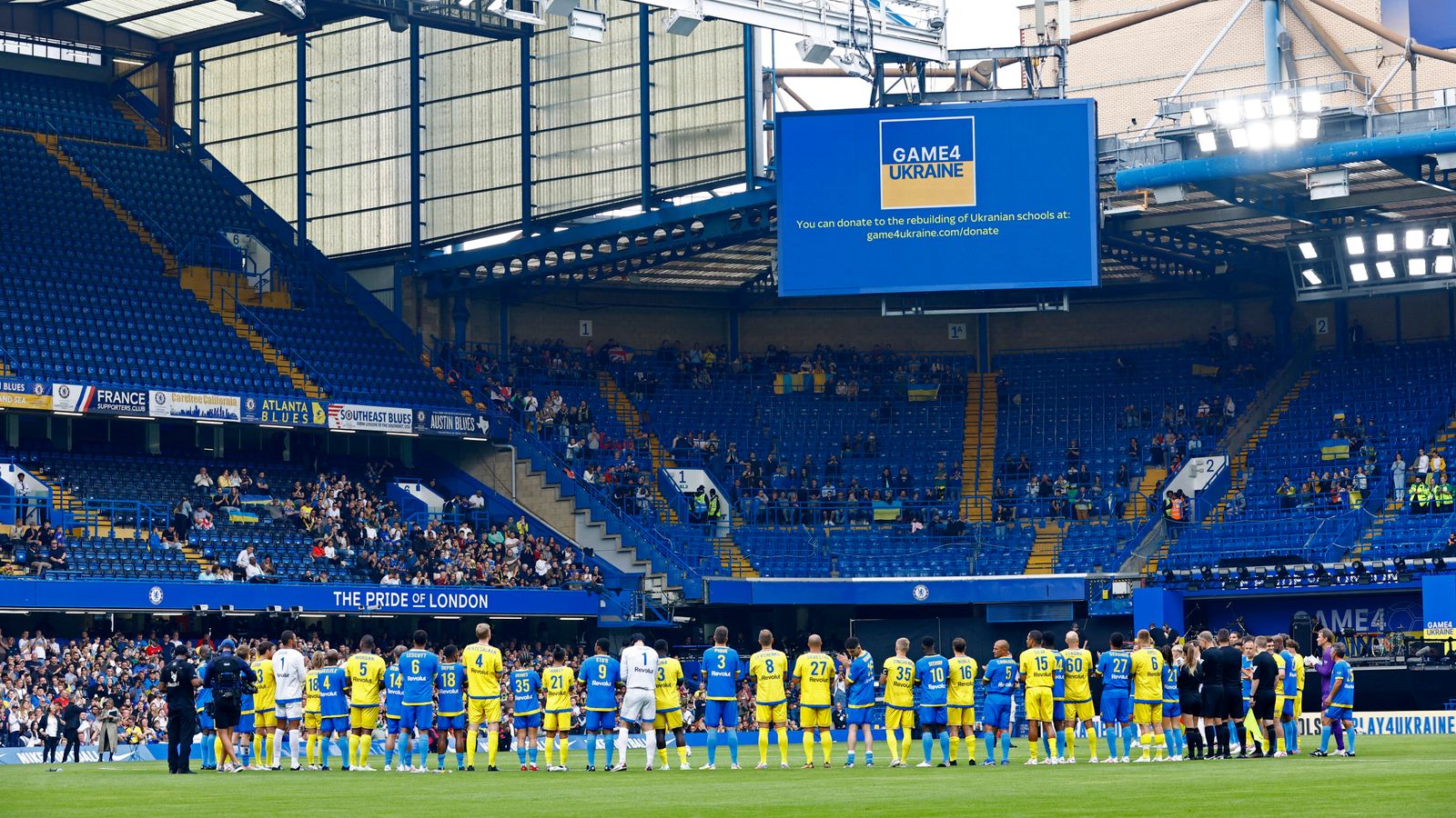 The teams lined up before their charity match, Game4Ukraine