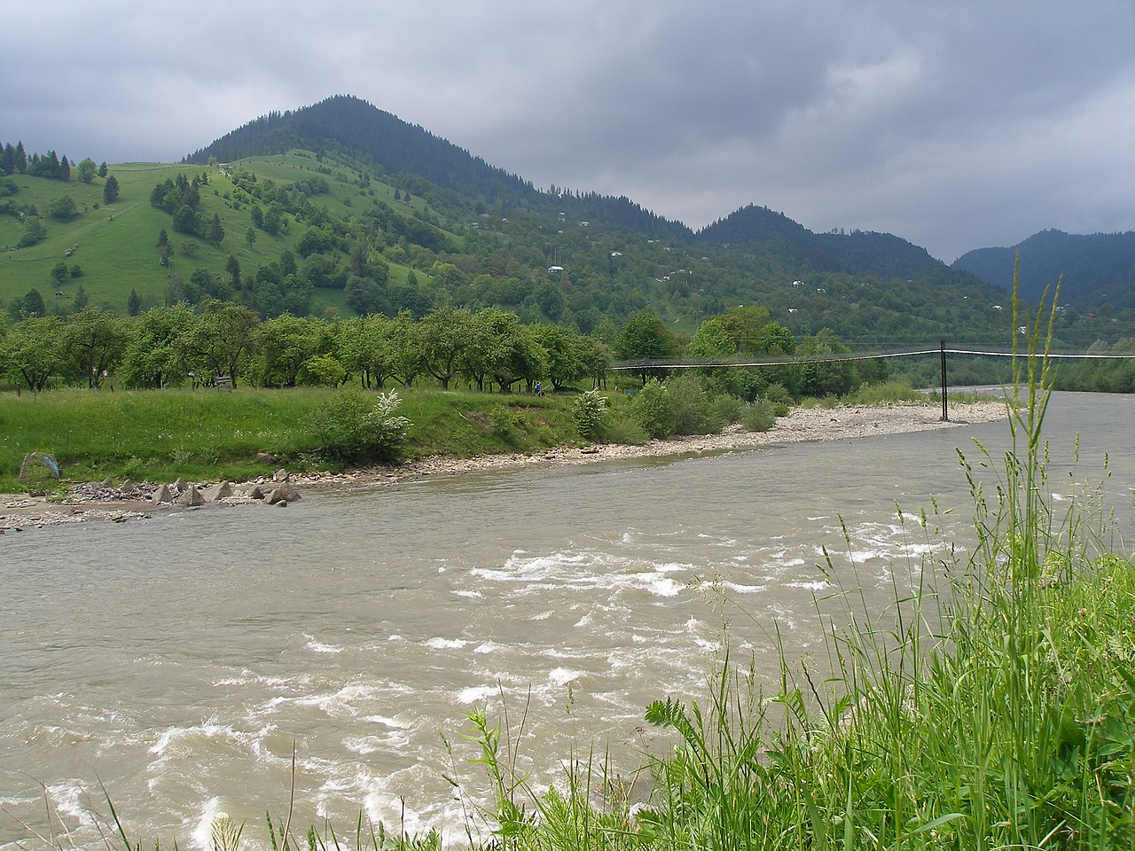 Installation of concrete triangles on the Carpathian Cheremosh River