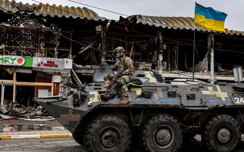 Ukrainian military successes: A Ukrainian armored vehicle patrols a street in Bucha