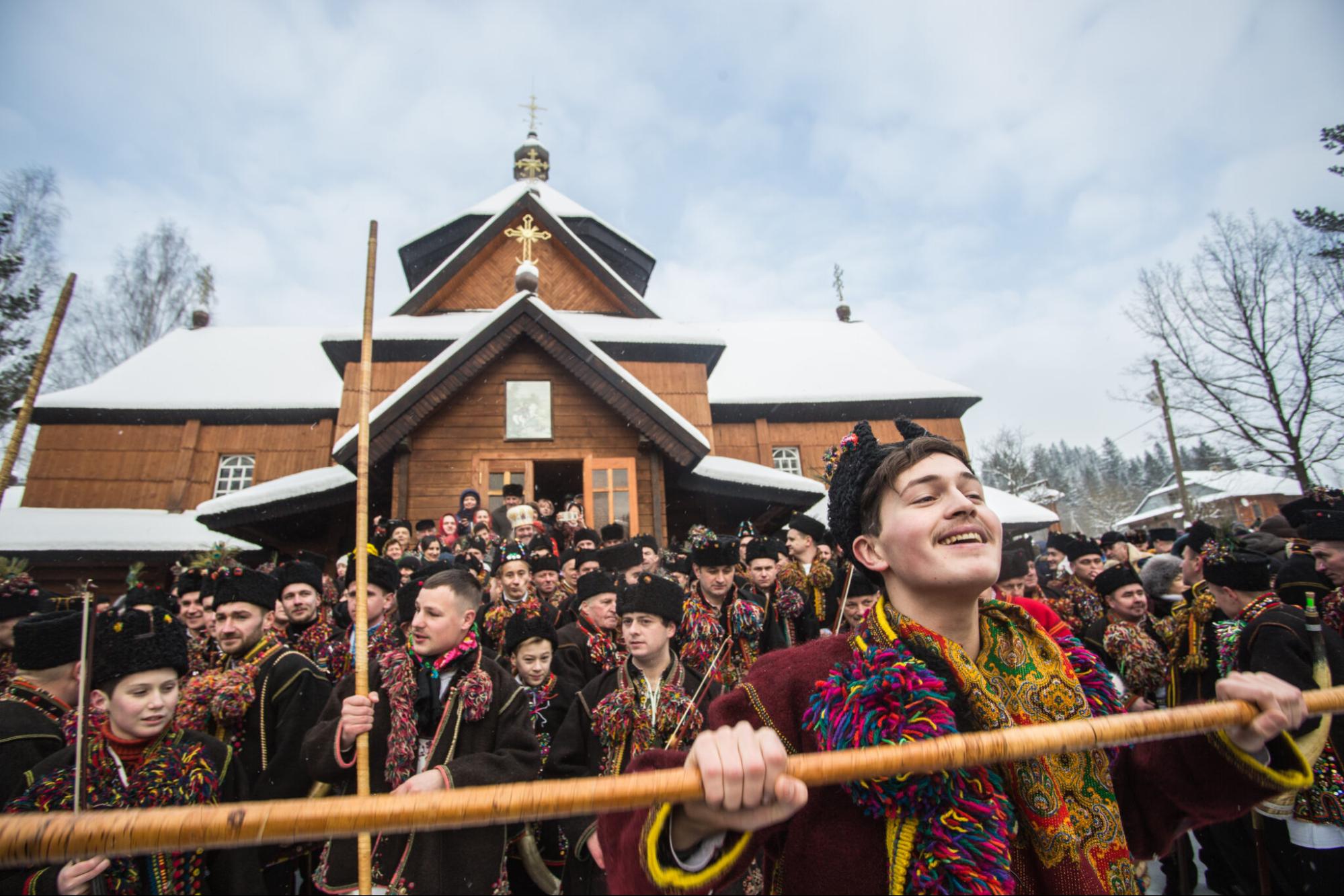 For the annual Christmas caroling festival, carolers gather near the church of the Nativity of the Blessed Virgin Mary in the village of Kryvorivnia