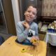Solutions from Ukraine: 12-year-old boy with cerebral palsy uses AI to build website for candle workshop to support UAF and family home dream